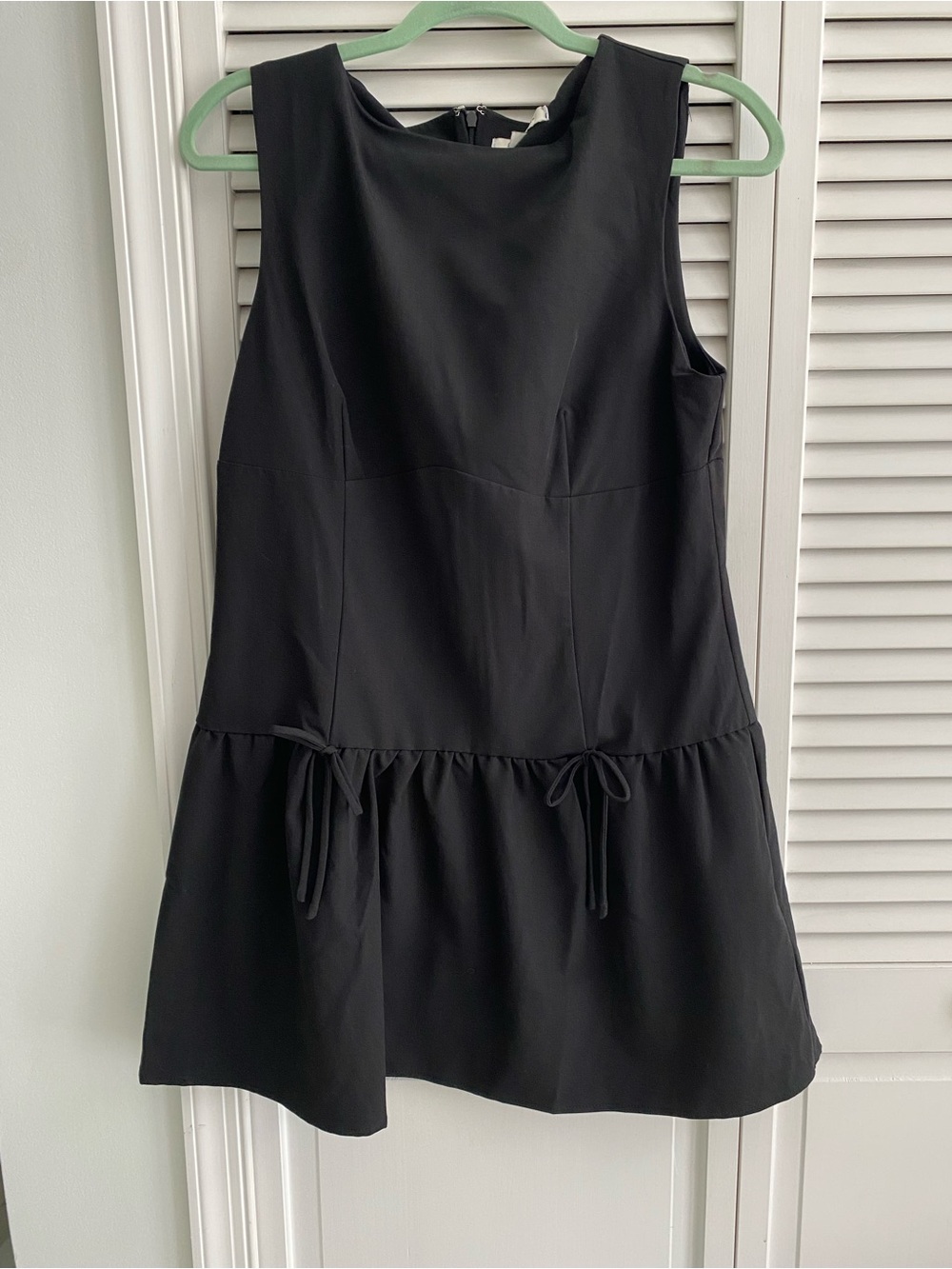 Francesca’s Classic Black Sleeveless Drop-Waist Dress with bows